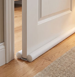 Bas de porte double isolant